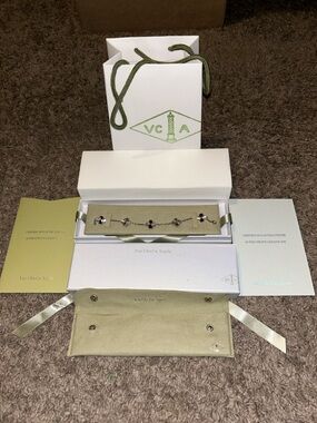 Van Cleef & Arpels 18k silver 5-Flower Bracelet